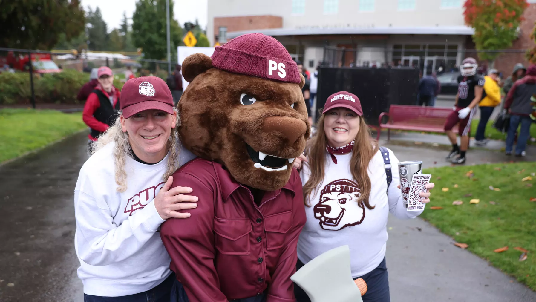 Grizz with Art Director Kris Nyström (left), who designed the mascot's new look.