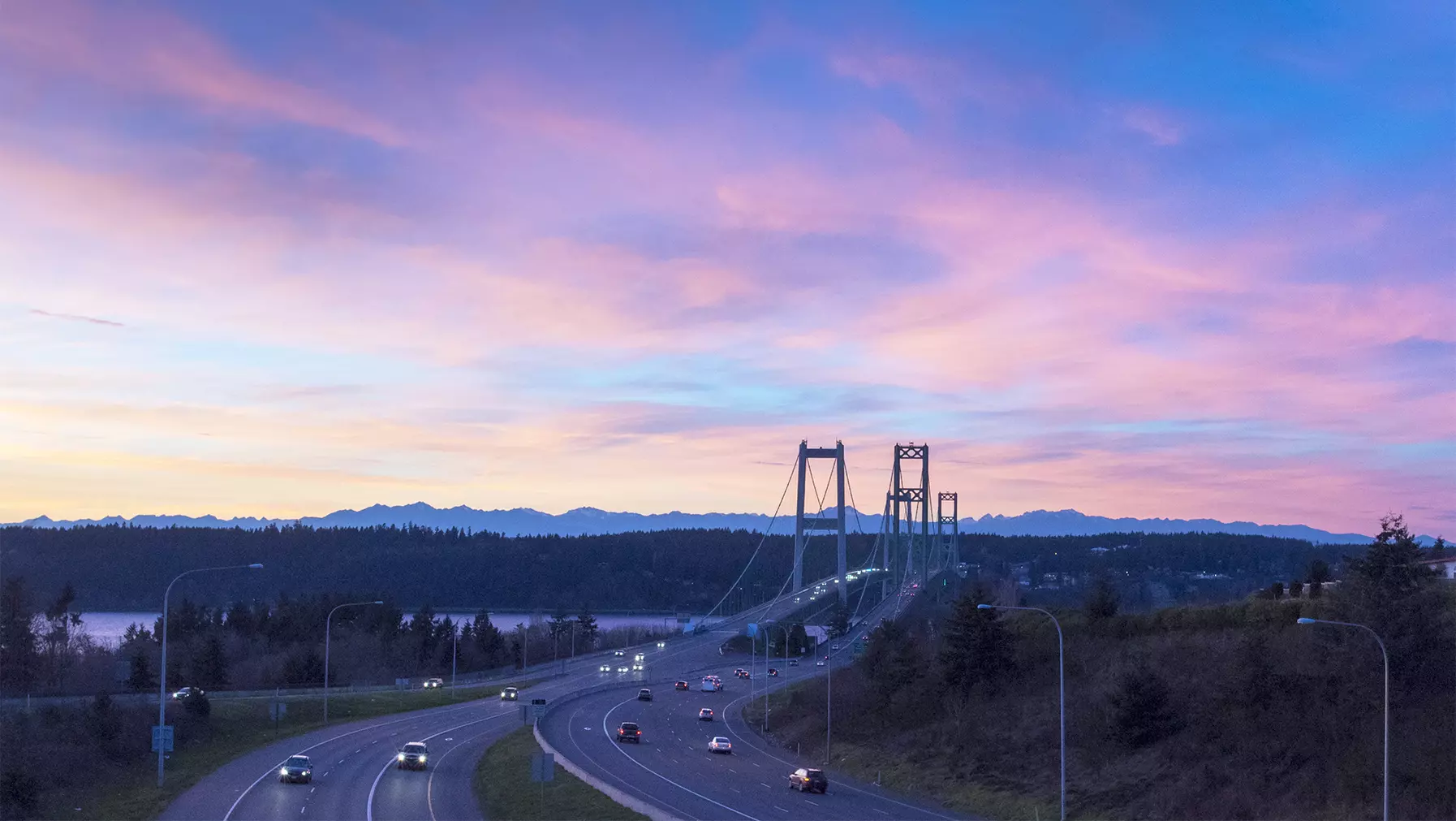 Aerial view of the narrows bridge during a sunset.