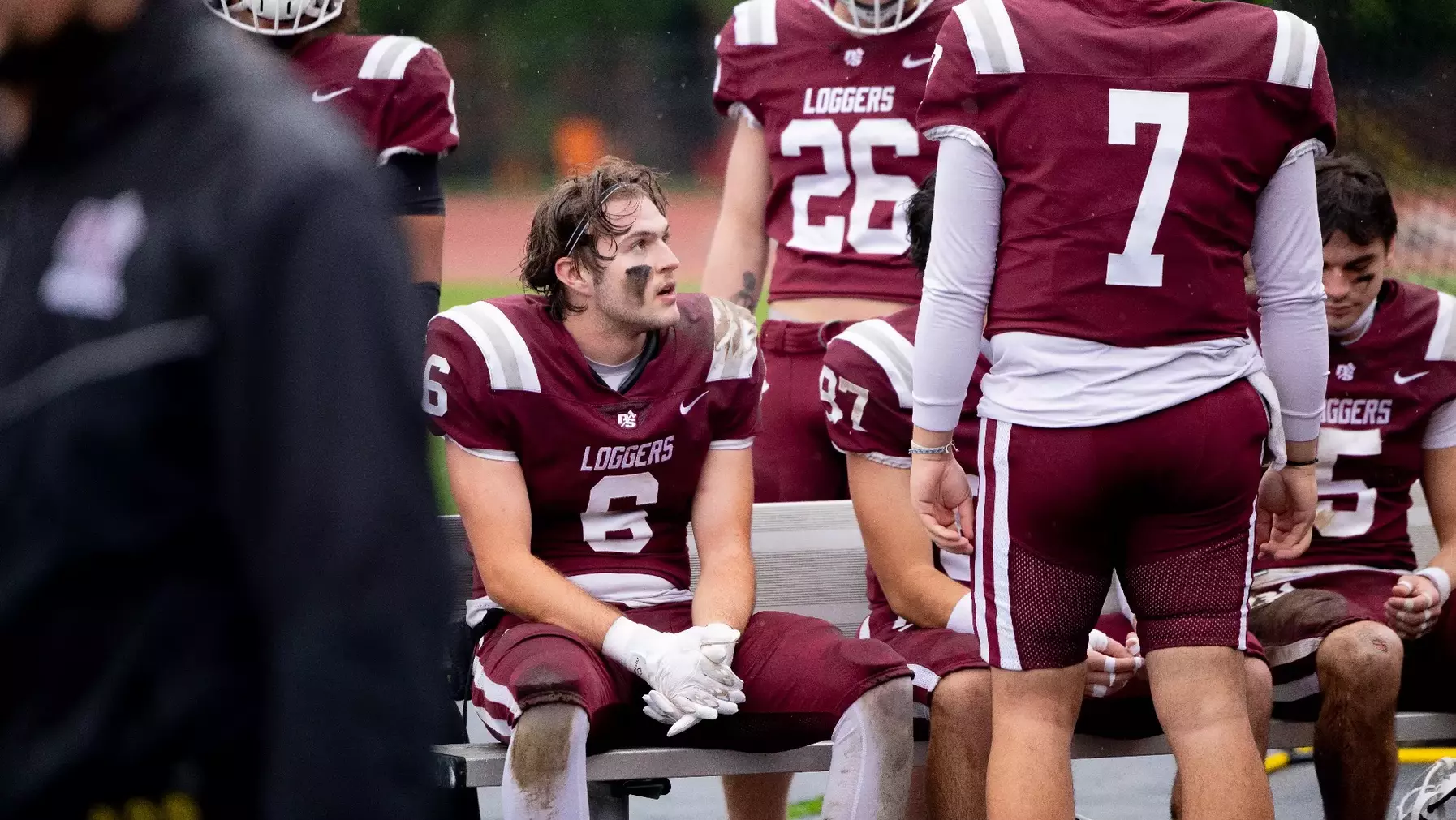 Jake Elorduy ’26 on the bench during halftime of a Logger Football game.