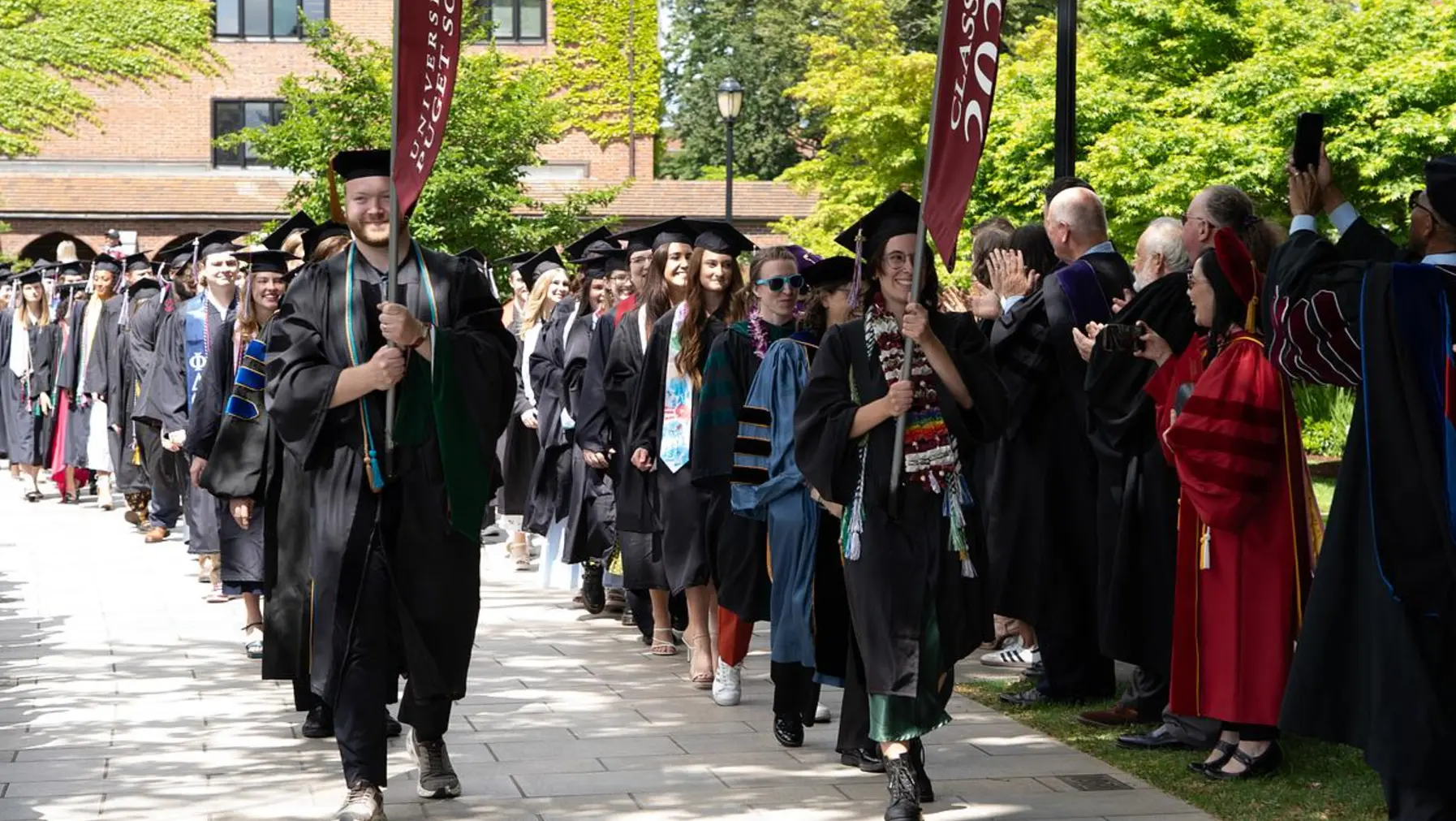 Faculty and students line up for Commencement 2026