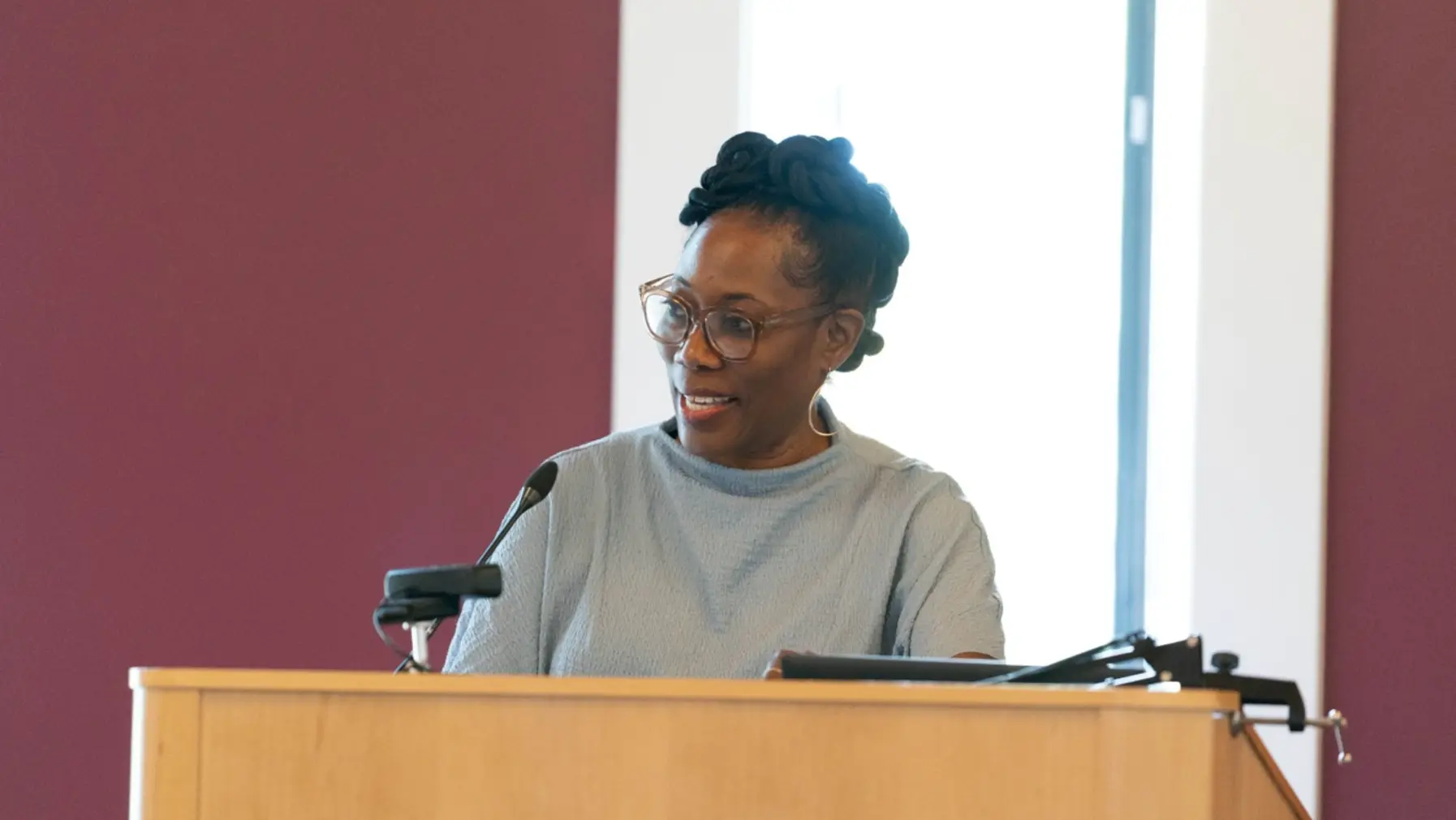 Renee Simms at lecturn