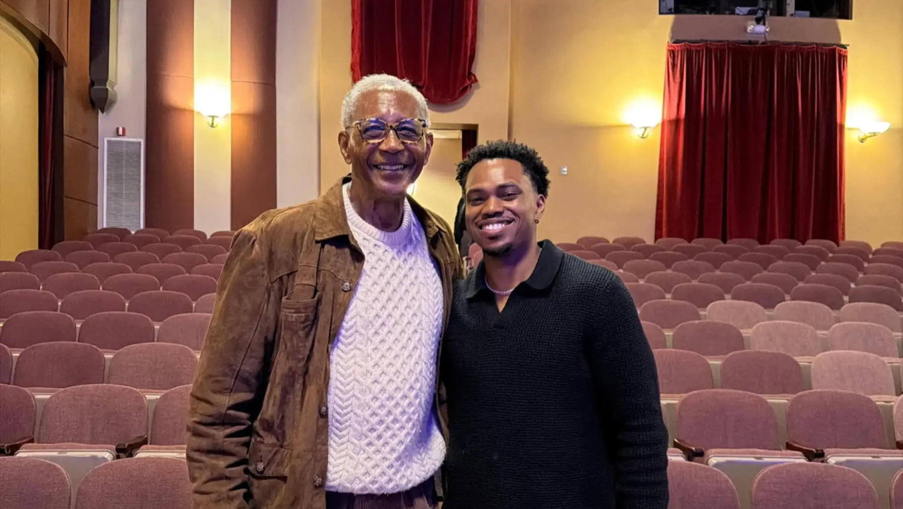 Louis Smith and Donovan Wilson in auditorium