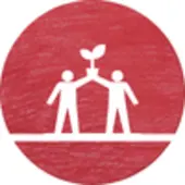 Image of two people holding up a plant