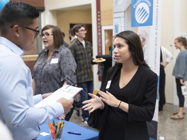Students and gather in Marshall Hall with potential future employers for the 2019 Fall Career Fair
