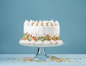 A decorated cake on a cake stand