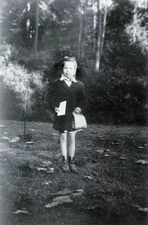Ramona Bennett Bill waits for the school bus on Illahee Road in Bremerton on the first day of third grade in 1946.