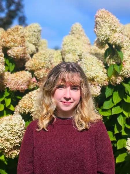 A headshot of Peer Allie leader Sophia