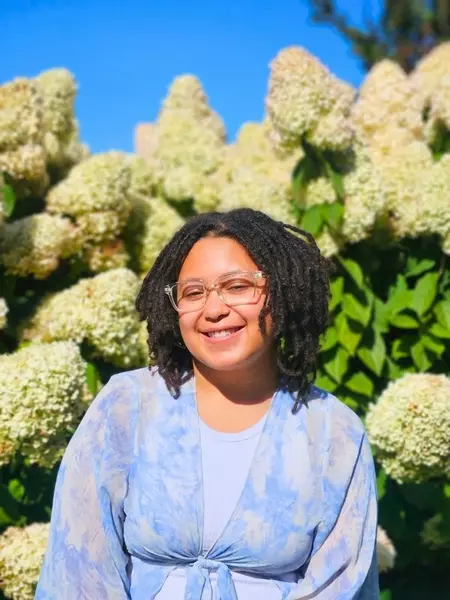 A headshot of Peer Allie leader Da'Nae