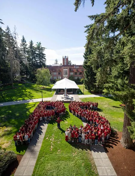 Class of 2030 group photo in the shape of 'PS'