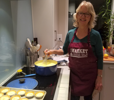 Susan Strobel ’70 prepares lemon curd for the tarts